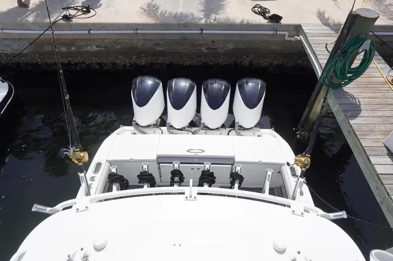  Yacht Photos Pics 2016 Everglades 435 Center Console with four powerful outboard engines docked.