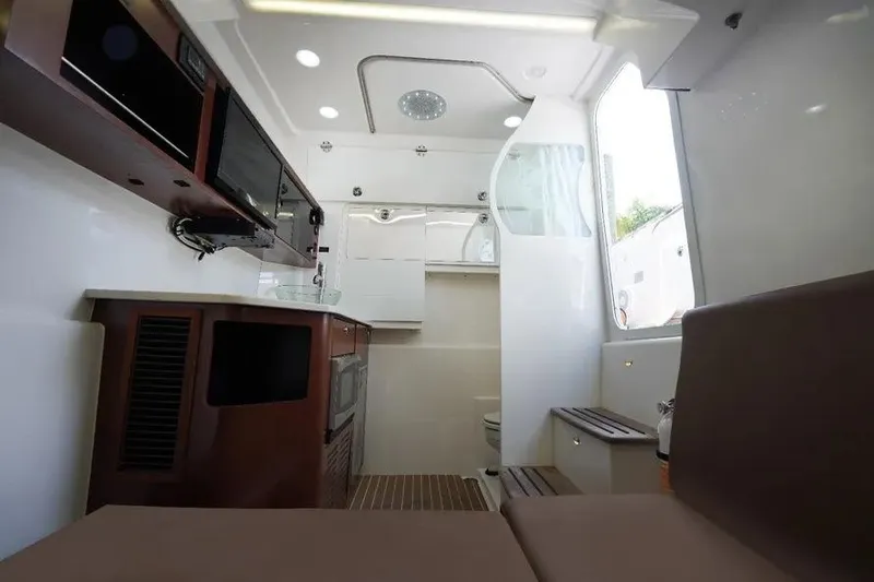  Yacht Photos Pics Interior of 2016 Everglades 435 Center Console boat with modern amenities and sleek design.