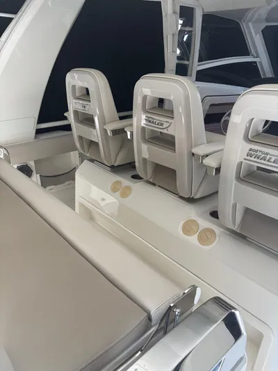 Demo Diamond Yacht Photos Pics 2017 Boston Whaler 420 Outrage interior with sleek seating and modern design.