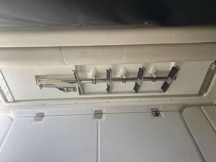 Demo Diamond Yacht Photos Pics Interior of a 2017 Boston Whaler 420 Outrage boat, featuring rod holders.