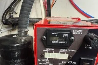  Yacht Photos Pics Engine control panel of a 2021 Regal 38 XO boat, showing engine hours and gauges.