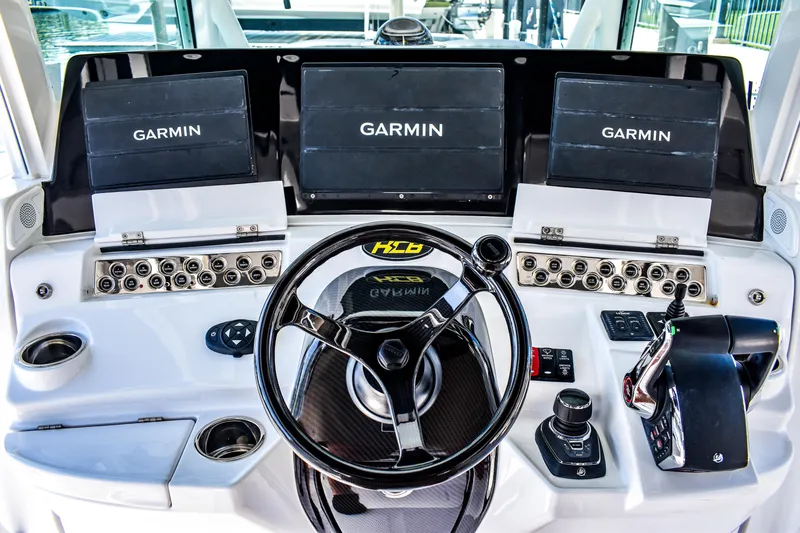 Water Bird Yacht Photos Pics Helm of 2025 HCB 42 Lujo with Garmin displays and advanced controls.