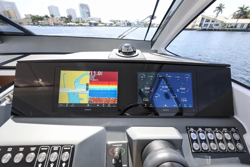  Yacht Photos Pics Dashboard of 2025 Valiatt 380 Bowrider with Garmin navigation displays on water.
