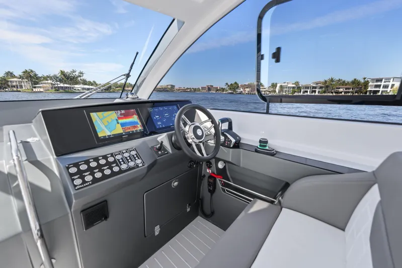  Yacht Photos Pics 2025 Valiatt 380 Bowrider cockpit with modern controls and waterfront view.