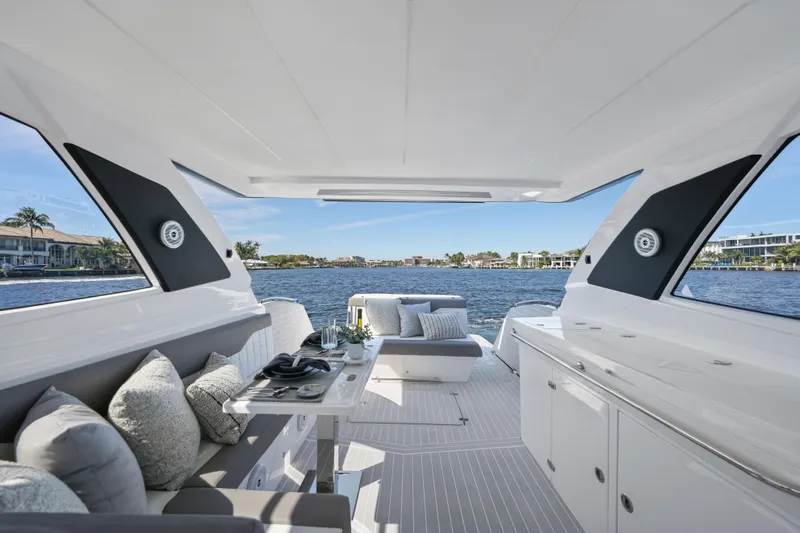  Yacht Photos Pics Luxurious 2025 Valiatt 380 Bowrider interior with elegant seating and scenic waterfront view.