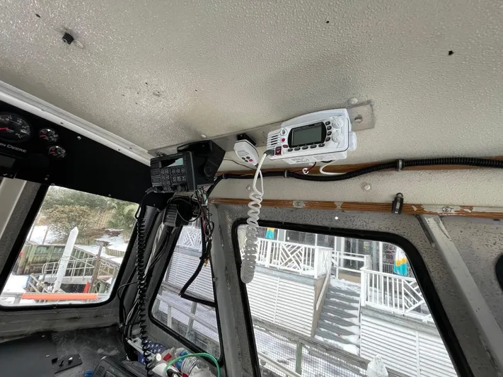 Super Voyager III Yacht Photos Pics Interior of a 1972 Swiftships commercial passenger vessel with communication equipment.