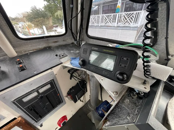 Super Voyager III Yacht Photos Pics Interior of a 1972 Swiftships commercial passenger vessel cockpit with navigation equipment.