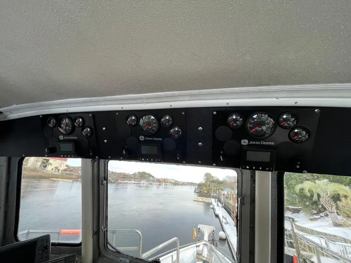 Super Voyager III Yacht Photos Pics Interior view of a 1972 Swiftships commercial passenger boat dashboard with gauges.