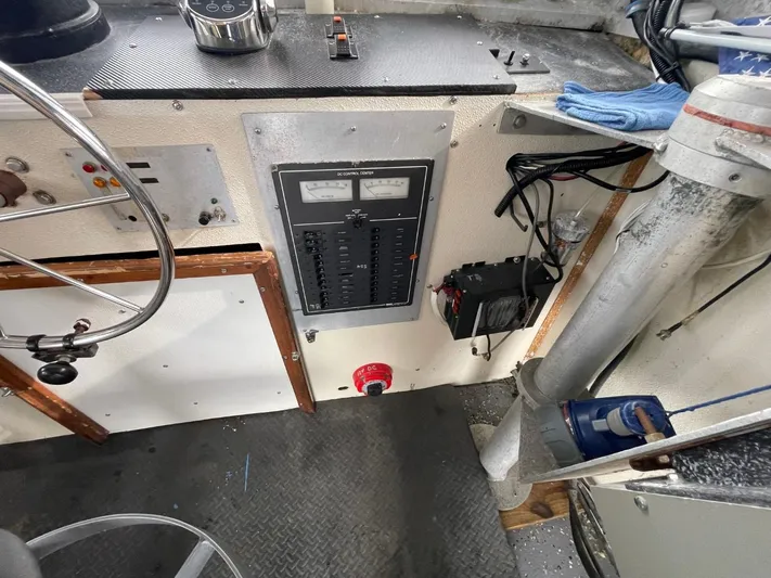 Super Voyager III Yacht Photos Pics 1972 Swiftships Commercial Passenger boat control panel with gauges and steering wheel.