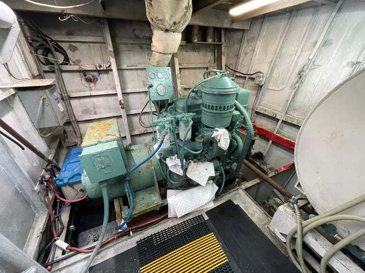 Super Voyager III Yacht Photos Pics Engine room of a 1972 Swiftships commercial passenger vessel, featuring machinery and equipment.