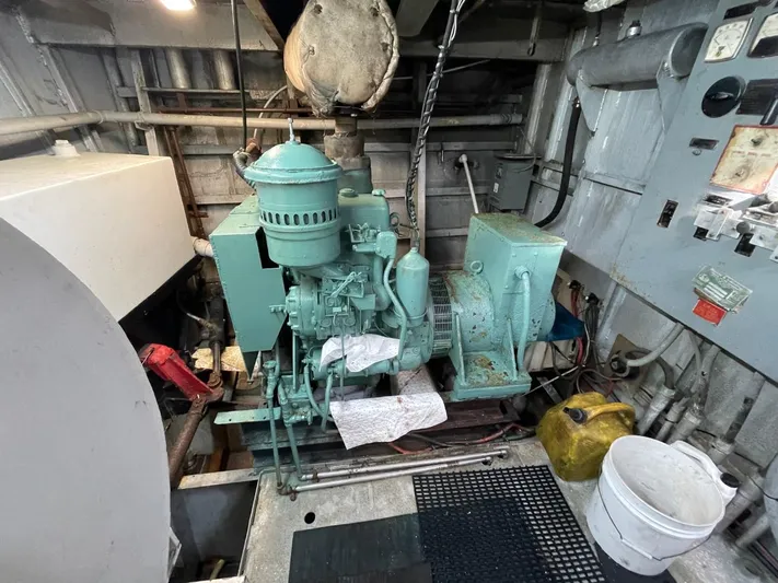 Super Voyager III Yacht Photos Pics Engine room of a 1972 Swiftships commercial passenger vessel, showcasing machinery and equipment.