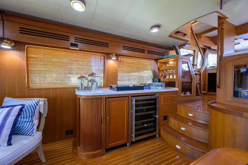 Bandol Yacht Photos Pics Luxurious 2006 Marlow 78E yacht interior with wooden cabinetry and modern amenities.