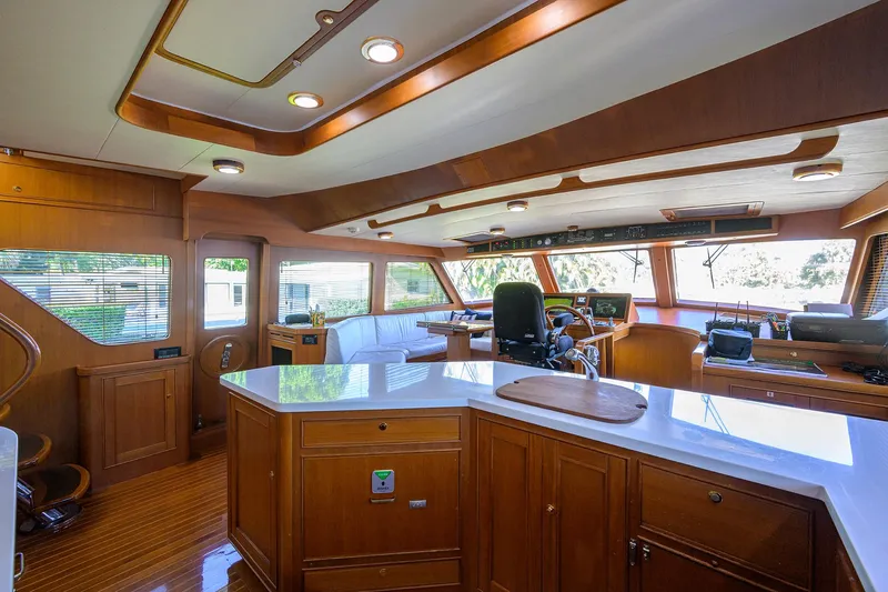 Bandol Yacht Photos Pics Luxurious 2006 Marlow 78E yacht interior with polished wood and modern amenities.