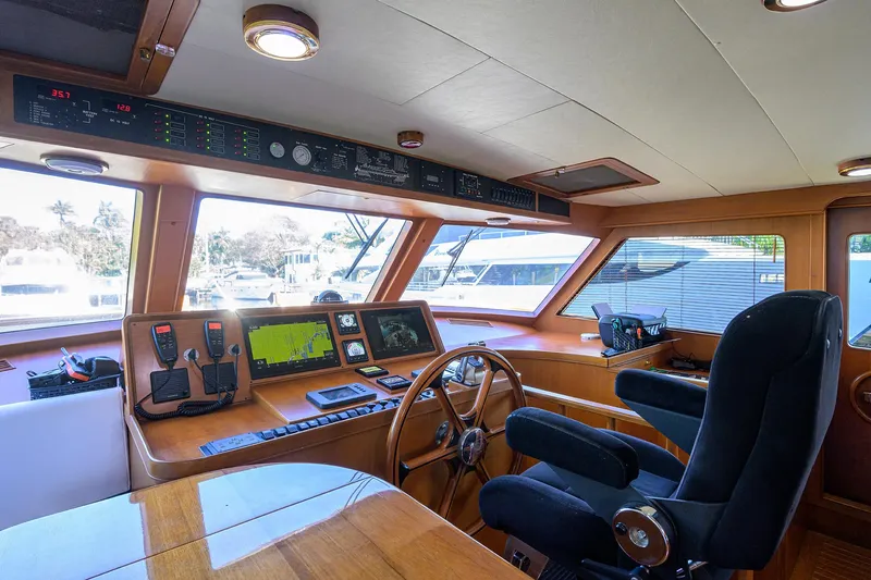 Bandol Yacht Photos Pics Luxurious 2006 Marlow 78E yacht helm with advanced navigation systems and plush seating.
