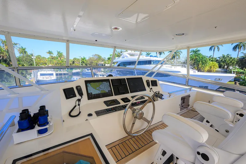 Bandol Yacht Photos Pics Luxurious 2006 Marlow 78E yacht helm with modern navigation equipment and panoramic views.