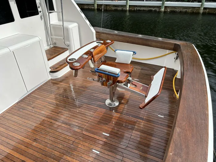 Rusty Yacht Photos Pics 2006 Viking 52 Convertible yacht deck with fishing chair and teak flooring.