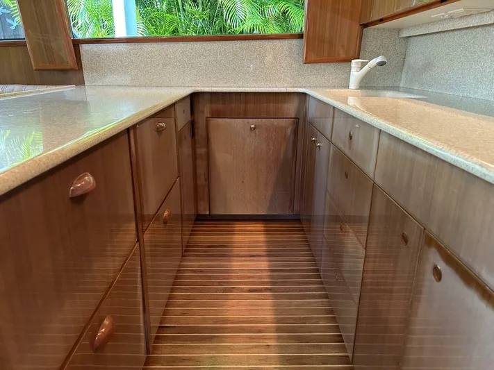 Rusty Yacht Photos Pics Luxurious wooden kitchen interior of 2006 Viking 52 Convertible yacht.