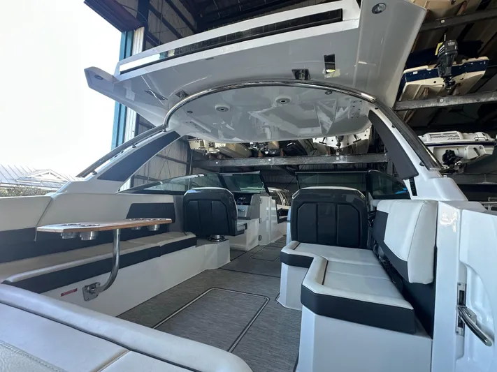  Yacht Photos Pics 2022 Cobalt R33 boat interior with sleek seating and modern design.