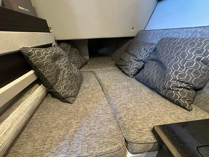  Yacht Photos Pics Cozy interior seating with patterned cushions in 2022 Cobalt R33 boat.