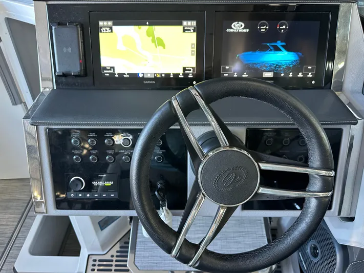  Yacht Photos Pics 2022 Cobalt R33 dashboard with steering wheel and dual navigation screens.