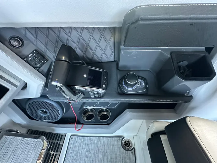  Yacht Photos Pics 2022 Cobalt R33 interior console with modern controls and speaker system.