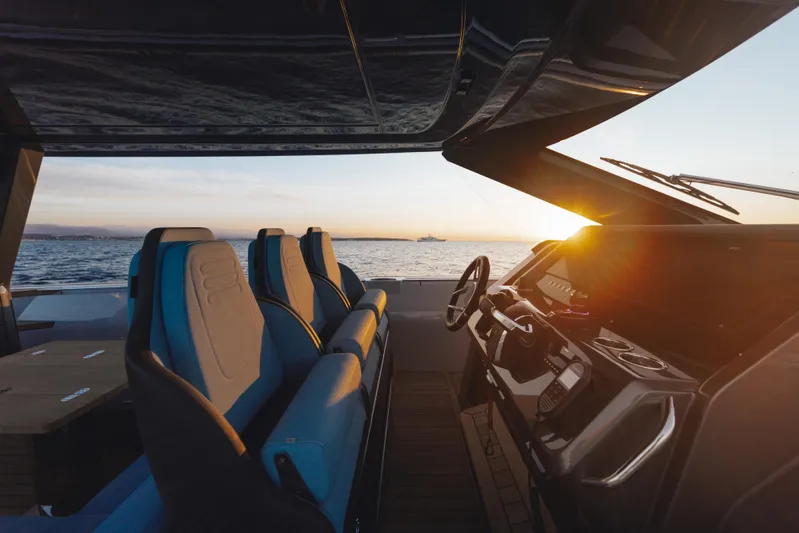  Yacht Photos Pics Luxury Pirelli 47 yacht interior at sunset, 2026 model, with ocean view.