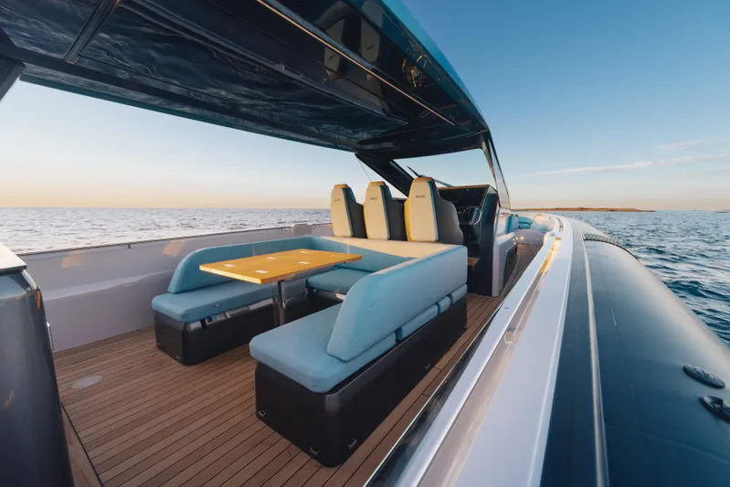  Yacht Photos Pics Luxury Pirelli 47 yacht interior, 2026 model, with elegant seating and ocean view.