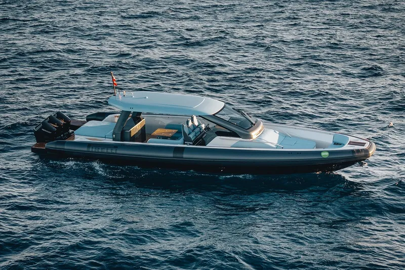  Yacht Photos Pics 2026 Pirelli 47 yacht cruising on open water, sleek design and powerful engines.