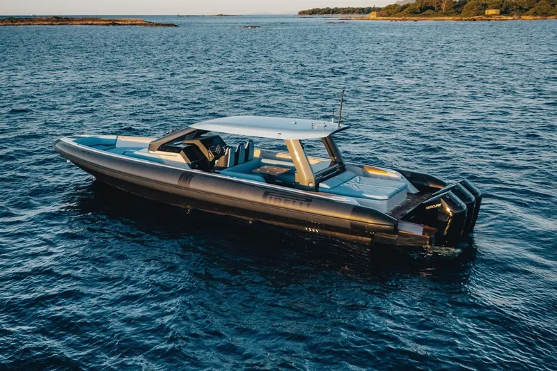  Yacht Photos Pics Luxury Pirelli 47 boat on open water, 2026 model, sleek design.