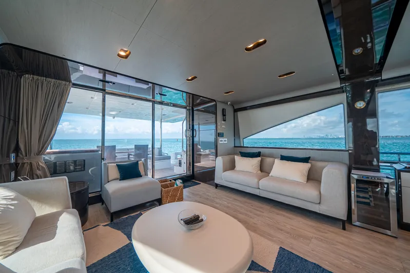 April Fools Yacht Photos Pics Luxurious interior of 2018 Azimut 80 Flybridge yacht with ocean view.