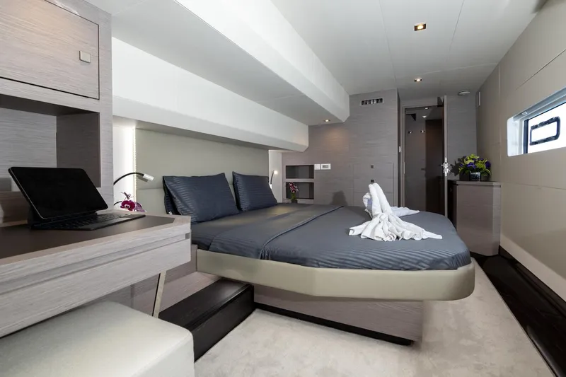  Yacht Photos Pics Luxurious bedroom interior of 2022 Fountaine Pajot MY6 yacht with modern decor.