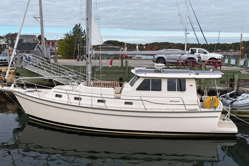  Yacht Photos Pics 2008 Island Packet SP Cruiser docked at a marina, showcasing its sleek design.