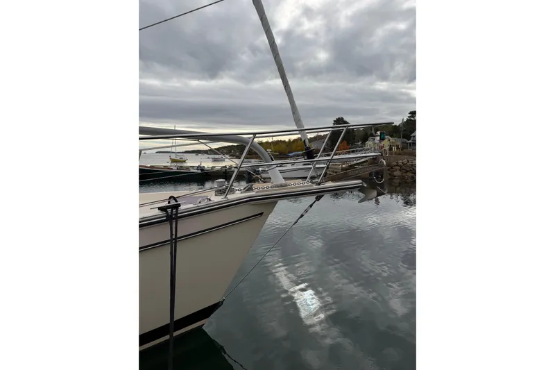  Yacht Photos Pics 2008 Island Packet SP Cruiser docked in a serene marina setting.