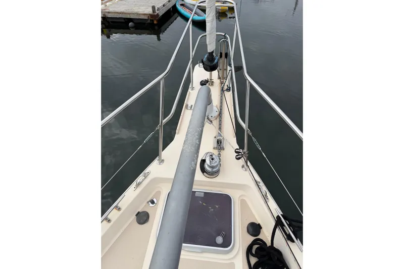  Yacht Photos Pics 2008 Island Packet SP Cruiser deck view with railing and winch.