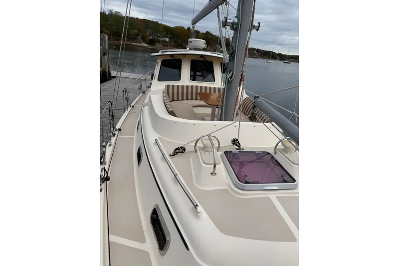  Yacht Photos Pics 2008 Island Packet SP Cruiser sailboat docked, showcasing deck and cabin area.