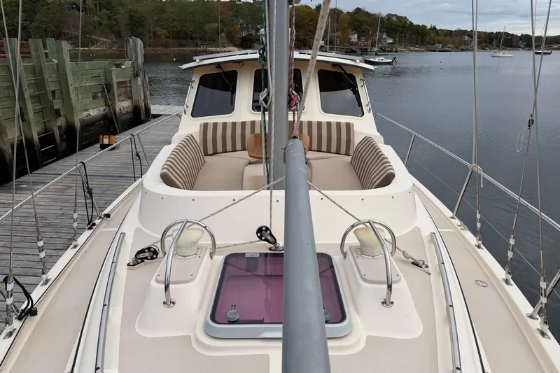  Yacht Photos Pics 2008 Island Packet SP Cruiser sailboat docked, featuring spacious deck and comfortable seating.