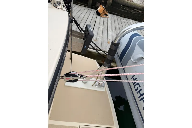  Yacht Photos Pics 2008 Island Packet SP Cruiser deck with rigging and docked inflatable boat.