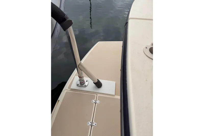  Yacht Photos Pics 2008 Island Packet SP Cruiser deck detail with railing, docked on calm water.