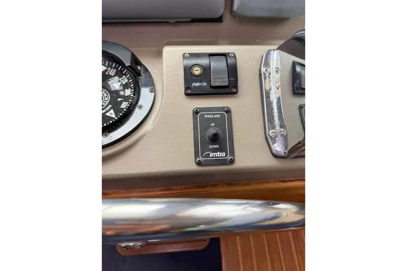  Yacht Photos Pics Control panel of a 2008 Island Packet SP Cruiser with compass and windlass switch.