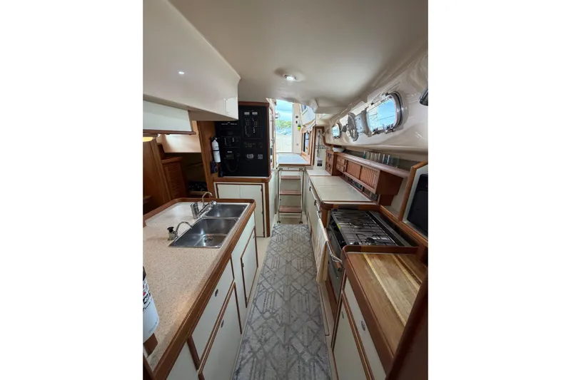  Yacht Photos Pics 2008 Island Packet SP Cruiser galley with modern appliances and ample counter space.