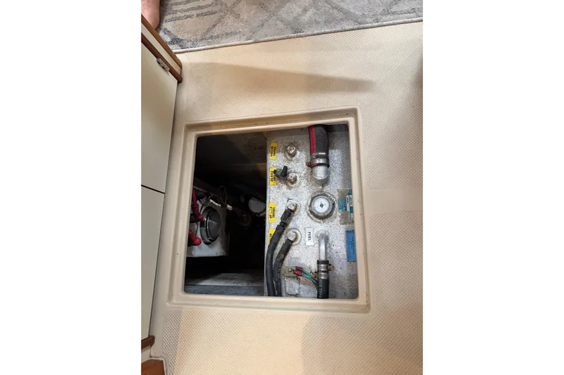  Yacht Photos Pics Access hatch of a 2008 Island Packet SP Cruiser, showing internal components and wiring.