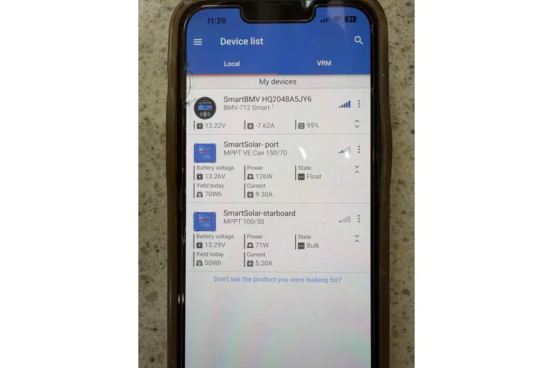  Yacht Photos Pics Smartphone displaying device list for solar power management on 2008 Island Packet SP Cruiser.