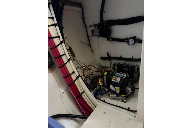  Yacht Photos Pics Engine compartment of 2008 Island Packet SP Cruiser with wiring and mechanical components.