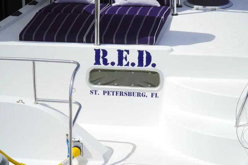 Red Yacht Photos Pics 2008 Fountaine Pajot Orana 44 catamaran with "R.E.D." and "St. Petersburg, FL" text.