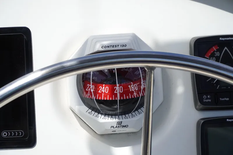 Red Yacht Photos Pics Compass and instruments on 2008 Fountaine Pajot Orana 44 catamaran.