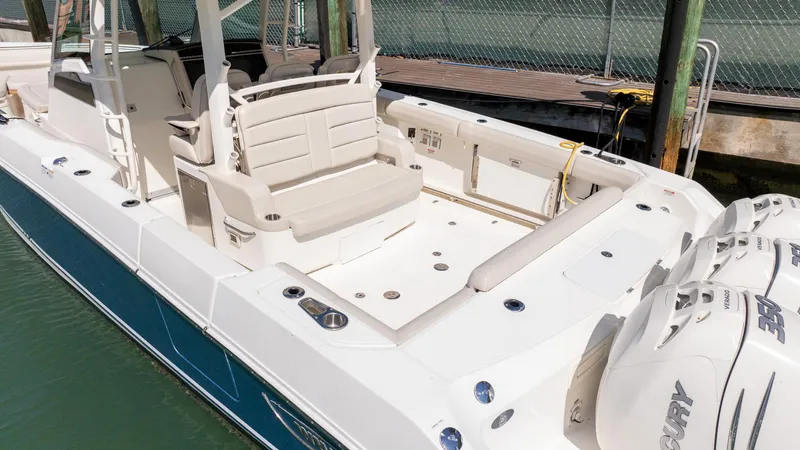  Yacht Photos Pics 2019 Boston Whaler 380 Outrage boat with spacious deck and seating area.