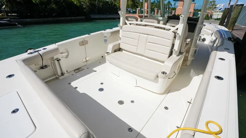  Yacht Photos Pics 2019 Boston Whaler 380 Outrage boat interior with seating and spacious deck.