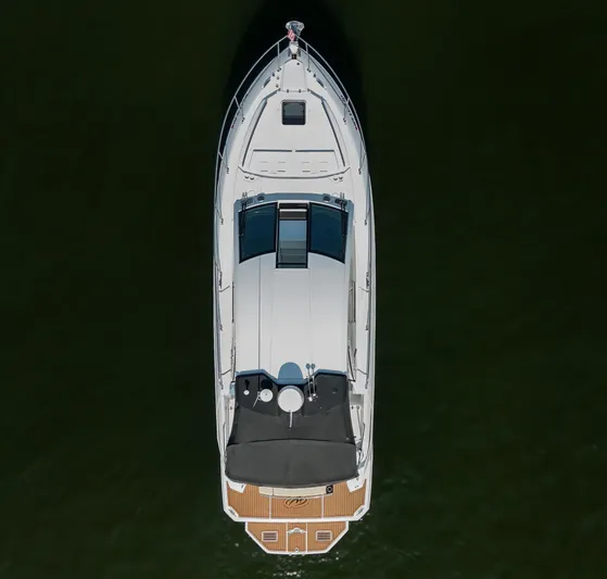  Yacht Photos Pics Aerial view of 2017 Monterey 360 Sport Coupe boat on water.