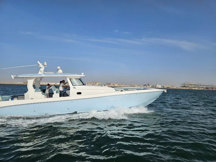  Yacht Photos Pics Custom FALCON 510 boat cruising on open water, 2025 model.