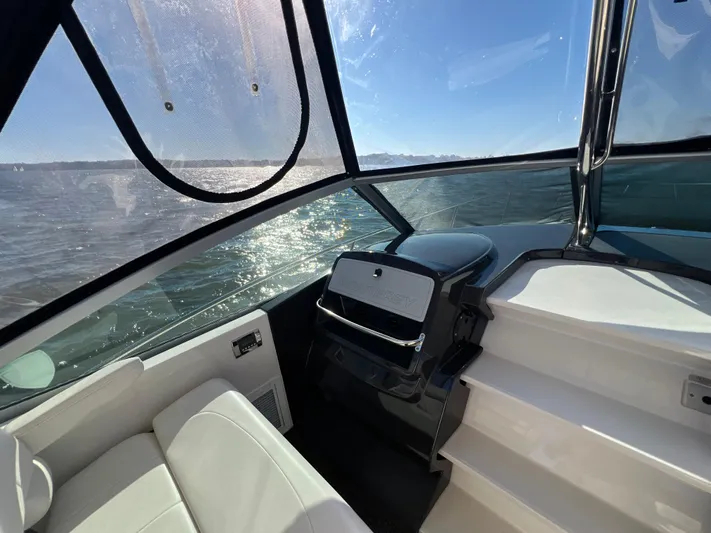  Yacht Photos Pics 2014 Monterey 320 Sport Yacht interior with ocean view through windshield.